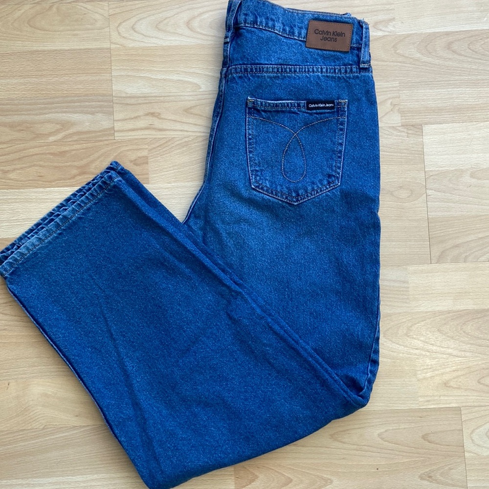 Calvin Klein size 30 high rise 90s fit jeans.